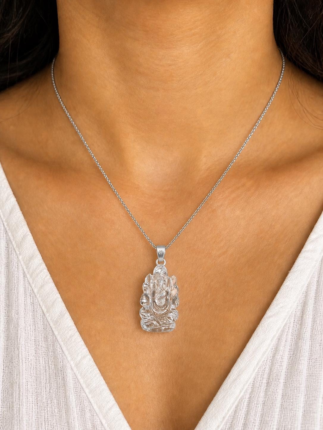 Clear Quartz Ganesha Pendant, 8g, 1.2x0.8x0.5in, Polished Spiritual Carving, Jewelry Piece