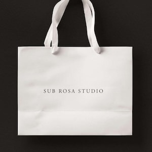 Gift bag for retail paper bags with custom printing Bespoke paper bags with ribbon tie closures Luxury matte paper bags gift bag