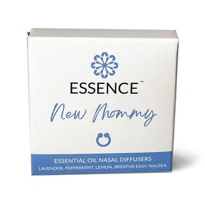 May include: White box with the text "ESSENCE™ New Mommy" and "ESSENTIAL OIL NASAL DIFFUSERS LAVENDER, PEPPERMINT, LEMON, BREATHE EASY, NAUSEA" printed on it.
