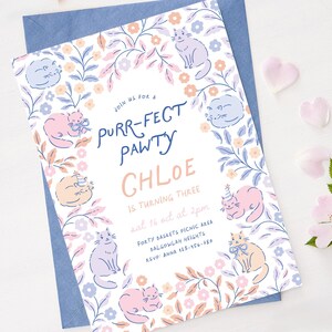 May include: A cat-themed birthday party invitation. The design includes a floral border with pastel-coloured cats and flowers. The text reads "Purr-fect Pawty" and "Chloe is turning three."