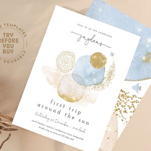 May include: A printable invitation for a first birthday party with a blue and gold watercolor design. The invitation says "Join us as we celebrate Jayden's first trip around the sun. Saturday 25 December - 1 o'clock. North Harbour Reserve | Condamine Street, Balgowlah. Kindly RSVP to Anna at 123-456-789."