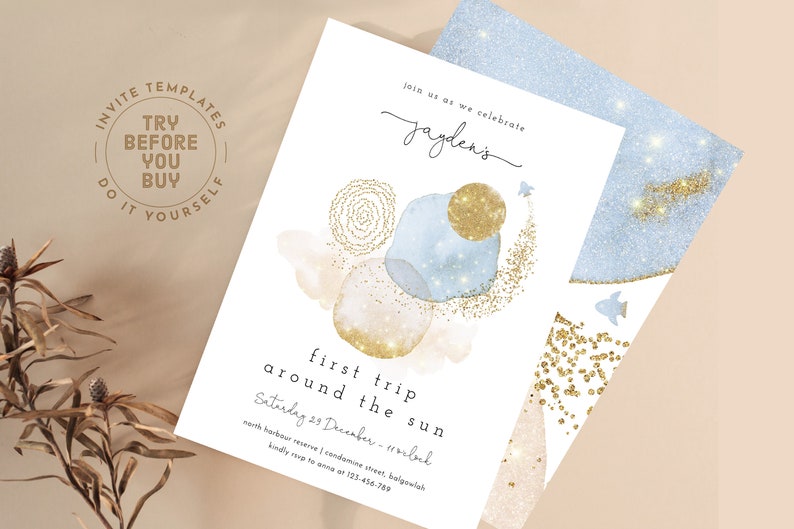 May include: A printable invitation for a first birthday party with a blue and gold watercolor design. The invitation says "Join us as we celebrate Jayden's first trip around the sun. Saturday 25 December - 1 o'clock. North Harbour Reserve | Condamine Street, Balgowlah. Kindly RSVP to Anna at 123-456-789."