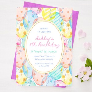 May include: A watercolor birthday invitation with a purple envelope. The invitation features colorful balloons and the text "Ashley's 5th Birthday". Decorative elements include flower petals and a flower.