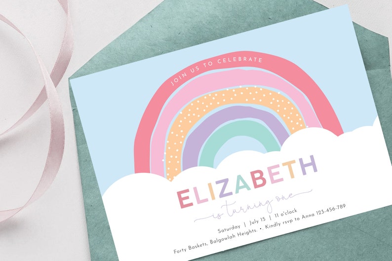 May include: A rainbow-themed birthday party invitation for Elizabeth, who is turning one. The invitation features a colorful rainbow with white clouds and the text "JOIN US TO CELEBRATE ELIZABETH is turning one" in a whimsical font. The invitation also includes the date, time, and location of the party, as well as contact information for RSVP.