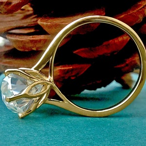 Tulip Basket Prongs Oval Cut Moissanite Classic Solitaire Engagement Ring, Customisable in any size and shape of moissanite.