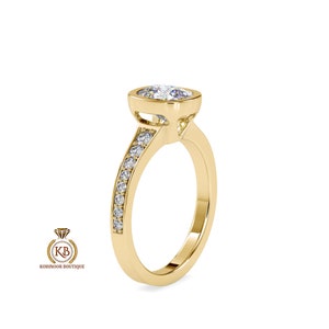 Elongated Cushion Cut Bezel Set Classic Solitaire with open gallery and side pave Moissanite Engagement ring. Ring for her, ring for women.