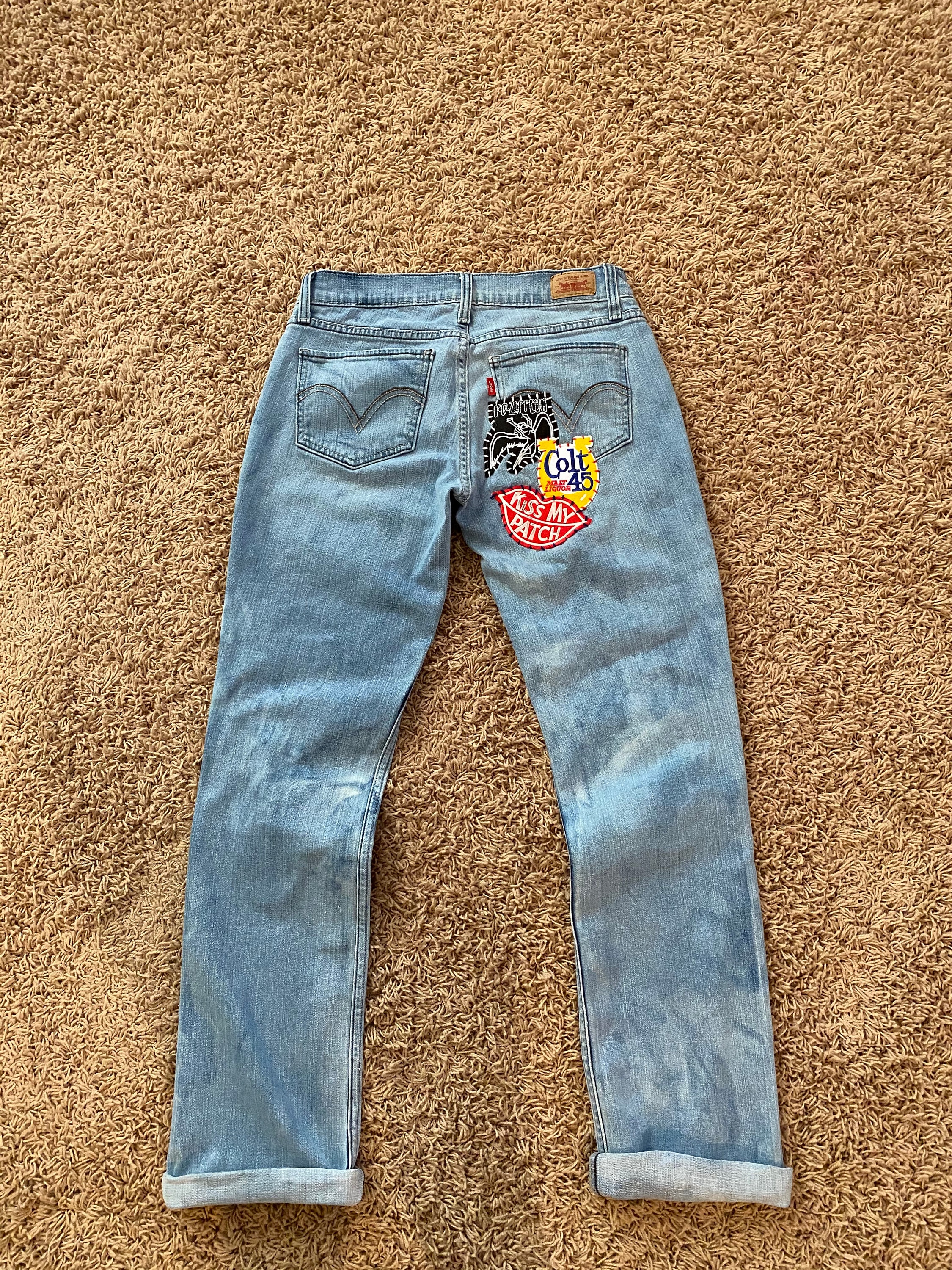 MISBHV Upcycled Monogram-Patchwork Jeans