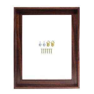 May include: A rectangular, dark brown wooden picture frame with a white interior. Includes hanging hardware: white plastic hooks, gold-colored metal hooks, and small gold screws. Ideal for displaying photos or artwork.