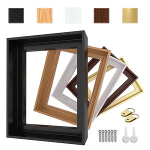 May include: A collection of wooden picture frames in various colors, including black, natural wood, white, dark brown, and gold. The frames are square and rectangular, with hardware and hanging hooks visible.