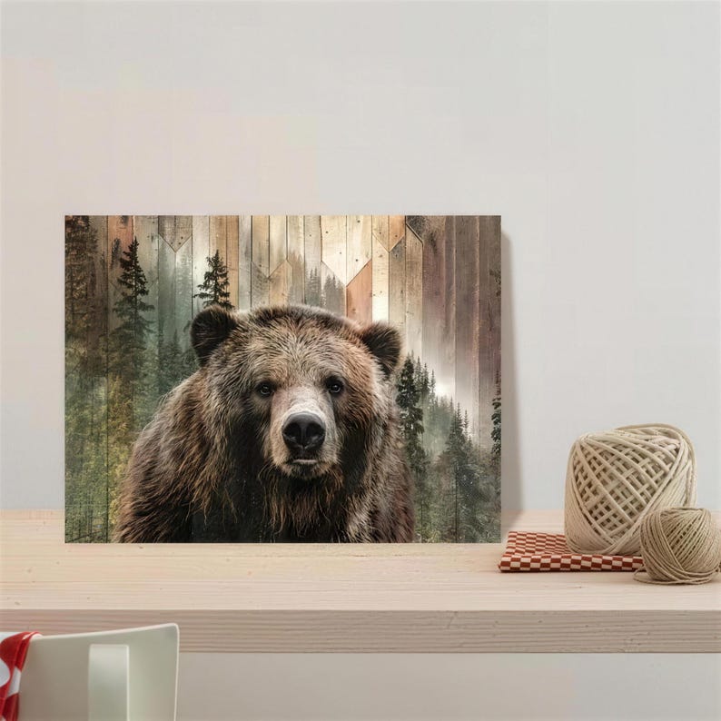 May include: A canvas print featuring a close-up of a brown grizzly bear with a detailed fur texture. The background shows a forest scene with tall evergreen trees and a wooden panel design.