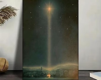 May include: A vertical canvas print depicting a celestial scene. A bright star shines in the night sky, with a beam of light illuminating a town below. The artwork features a color palette of dark blues, greens, and warm yellows.