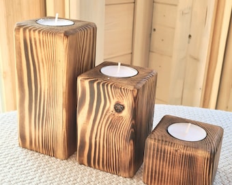 Set of 3 wooden tea light holders.