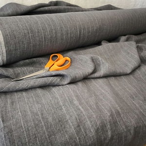Pure 100% linen fabric classic Pinstripe Dark Gray melange . 205 gsm. 150 cm wide.Softened, washed,dense woven Linen fabric.More Anberlinen