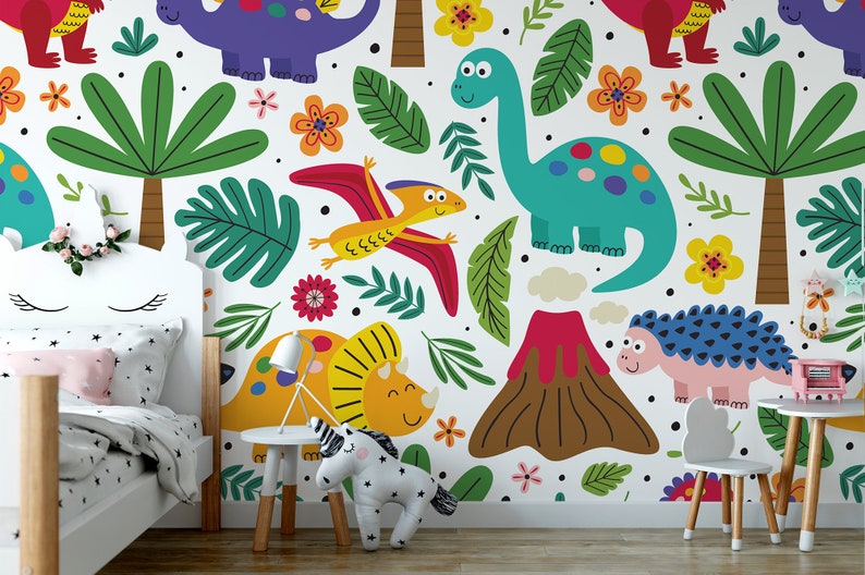 May include: A white wall mural with a colorful dinosaur theme. The mural features dinosaurs, palm trees, flowers, and a volcano. The mural is perfect for a child's bedroom.