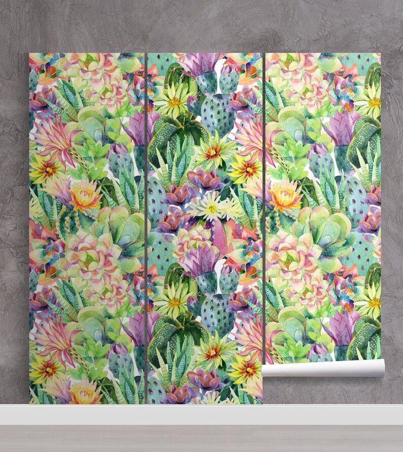 May include: A watercolor print featuring a seamless pattern of colorful cacti and succulents. The print features a variety of green, pink, yellow, and purple hues.