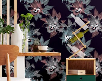 May include: A dark floral wallpaper with a white and pink floral pattern. A wooden table with a chair and a small wooden cabinet with a green drawer are in front of the wallpaper.