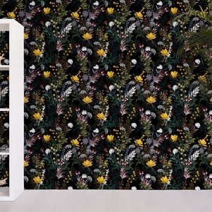 May include: Black wallpaper with a floral pattern featuring yellow, white, red, and green flowers. The wallpaper is shown in a room with a white shelf unit and a potted plant.