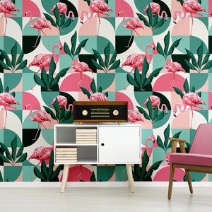 May include: A pink flamingo wallpaper with a geometric pattern of circles and squares. The wallpaper features pink flamingos and green tropical leaves on a white background.