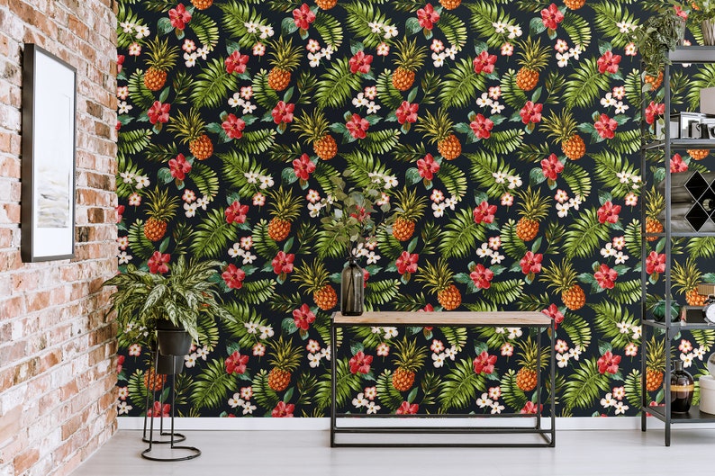 May include: A dark blue wallpaper with a tropical pattern featuring pineapples, green leaves, red flowers, and white flowers.