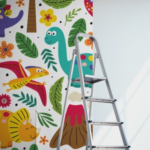 May include: A colorful dinosaur themed wallpaper mural with a green, blue, and yellow dinosaur, a red volcano, and green leaves on a white background.