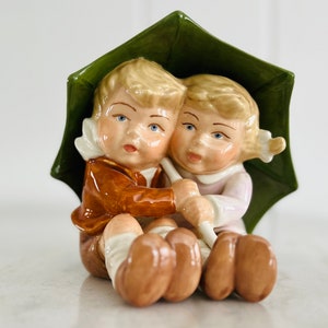 Charming vintage figurine, 1950s boy and girl under umbrella, for nursery, home decor, collectible, gift
