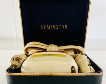 Vintage Remington 60 DeLuxe Electric Shaver with Case for Auto + Home, working, includes protector for head, cord and lighter adapter, prop