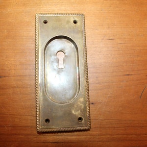 Pocket Door Cast Bronze Escutcheon with Rope Perimeter S-48