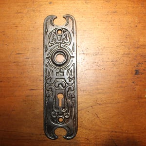 Antique Cast Iron Ornate Escutcheon with Worn Brass Plating S-99