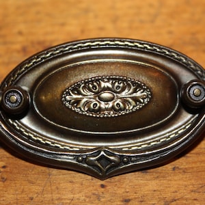 One Antique Brass Plated 2-1/4&quot; Drop Bail Drawer Pull G-37