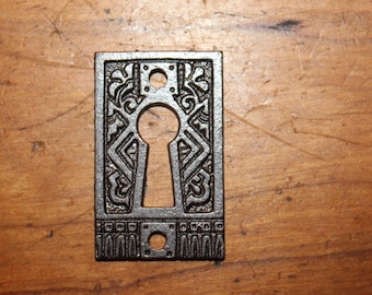 Small Ornate Antique Cast Iron Curio or Furniture Keyhole Escutcheon CC-150
