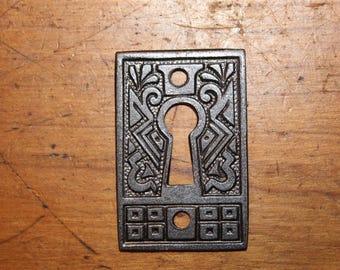 Small Ornate Antique Cast Iron Curio or Furniture Keyhole Escutcheon CC-103
