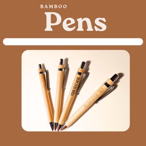 May include: Four bamboo pens with silver accents. The pens are engraved with the text "Your Text Here" and "For Love Letters Only".