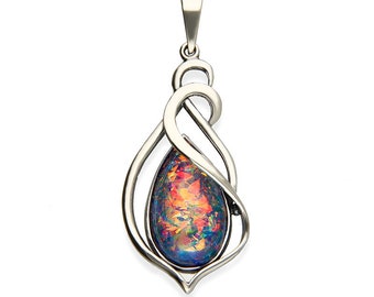 Silver pendant with iridescent mass