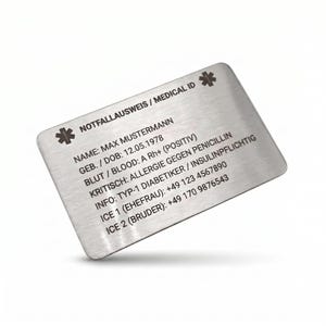 May include: A rectangular brushed stainless steel medical ID card featuring the text NOTFALLAUSWEIS / MEDICAL ID, Name: Max Mustermann, DOB: 12.05.1978, Blood: A Rh+ (Positiv), Allergy: Penicillin, Type-1 Diabetic, and two emergency contact numbers.