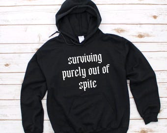 Nur aus Trotz überleben Hoodie