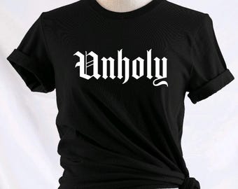 Impío - Disponible en camiseta, sudadera, sudadera con capucha, camiseta de tirantes o manga larga