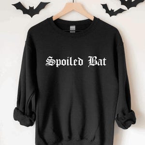 Sudadera con estampado de murciélago estropeado