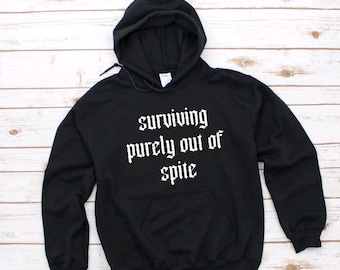 Surviving purely out of spite Hoodie
