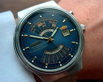 Vintage Japanische Seltene Uhr Orient Mehrjahreskalender, Automatik Herren Uhr, Kalender Uhr, Uhr mit blauem Zifferblatt, 21 Jewels