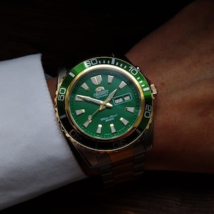 Orologio automatico vintage Orient Mako: placcato in oro, quadrante verde, impermeabile fino a 200 m