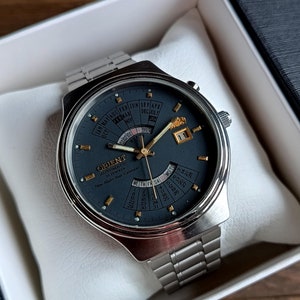 Vintage Japanische Seltene Uhr Orient Mehrjahreskalender, Automatik Herren Uhr, Kalender Uhr, Uhr mit grauem Zifferblatt, 21 Jewels