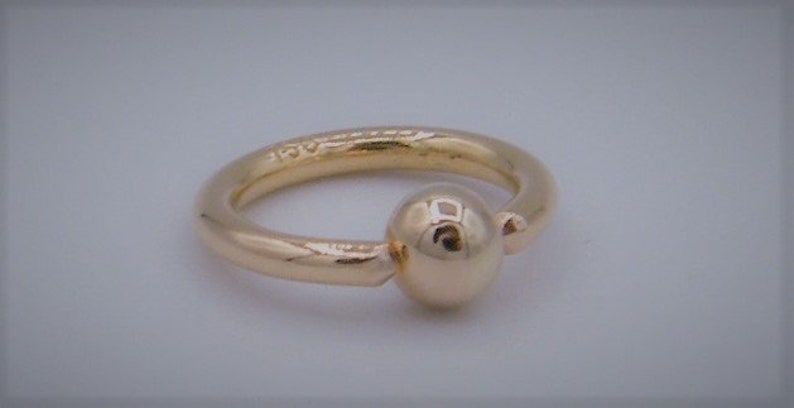 Closure clamp ball piercing 750 / gold ring with ball 18 carat image 2