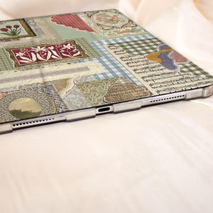 May include: A tablet case with a patchwork design. The case features floral motifs, musical notes, and gingham checks in green, pink, blue, and beige. The case has a clear border. The design is reminiscent of a collage.