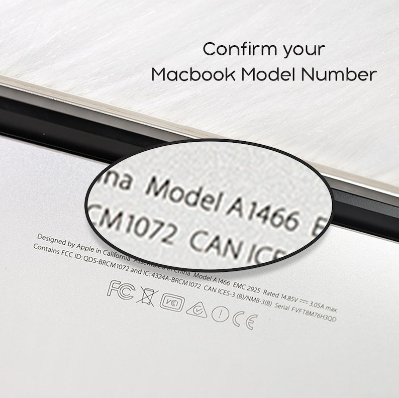 May include: A close-up of a Macbook with the text "Confirm your Macbook Model Number." The model number A1466 is visible, magnified by a circular lens. The Macbook is on a white surface.