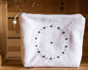 Floral makeup pouch with handembroidered Forget-Me-Not, White linen cosmetic bag