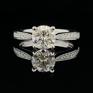 Platinum Diamond Engagement Ring. Stunning Certificated Diamond. 1.23 Carats. Diamond Set Shoulders.