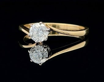 Anello vintage 'Crossover' in oro 18 carati bicolore con diamante solitario. Anello di fidanzamento con diamante. 0,60 carati.