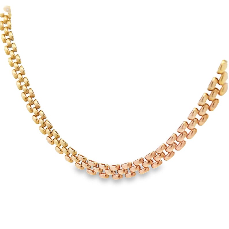 May include: A gold and rose gold chain necklace with a unique interlocking design.