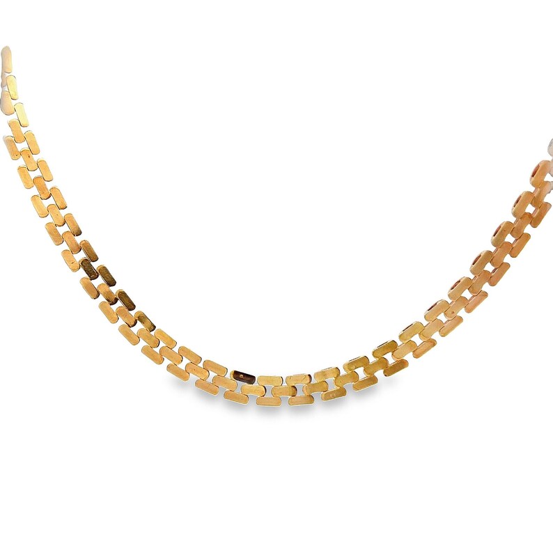 May include: A gold chain necklace with a box link design.