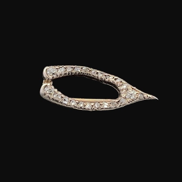Antique Early Victorian Old Mine Cut Diamond and Rose Cut Diamond Gold and Silver Set Wishbone Brooch. English Circa 1869/1870.